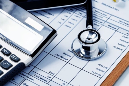 medical expenses calculator and paper